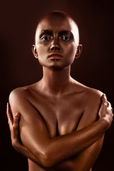 Obraz premium beautiful woman with a bronze bodypainting