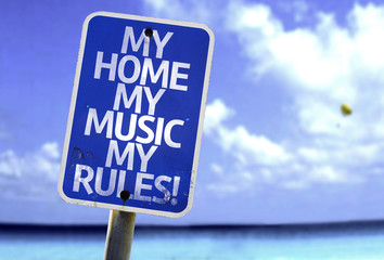 My Home My Music My Rules sign with a beach