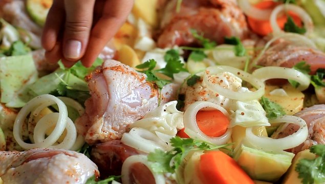 adding spices in the gourmet dish