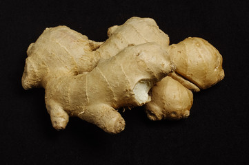 Ginger root isolated on the black background