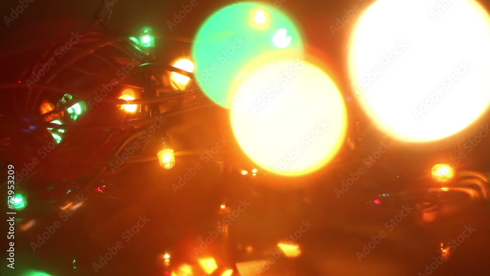 Poster colorful flashing christmas lights and bokeh seamless loop