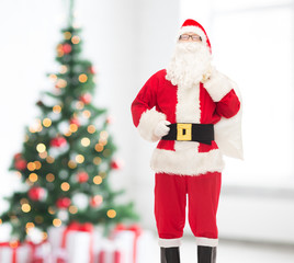 man in costume of santa claus with bag