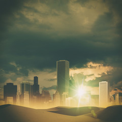 Fototapeta na wymiar Dramatic sunset over big city. Abstract natural backgrounds