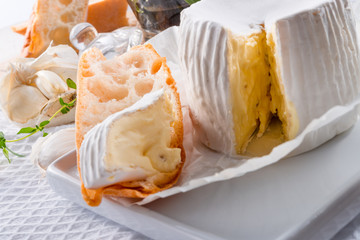 soft cheese with spicy olives