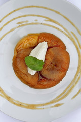 Tatin tart with vanilla cream, mint and apple sauce