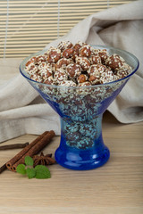 Peanut in honey with sesame seeds