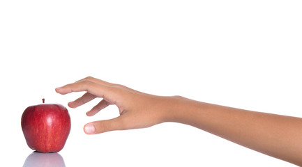 Girl hands reaching for a red apple over white background - 72956425