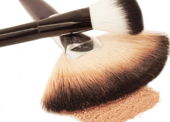 brushes and  face powder. close up