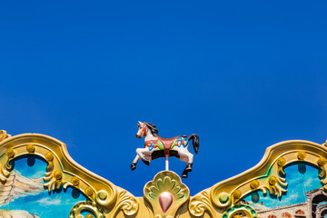 antique carousel horses tent in amusement park © Soonthorn
