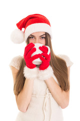 Cute brunette Christmas girl with hat and cup of tea