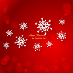 Fototapeta na wymiar Red Christmas background with paper snowflakes.