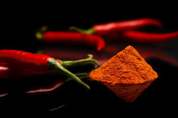 Studio shot chilli pepper, cayenne pepper isolated on black