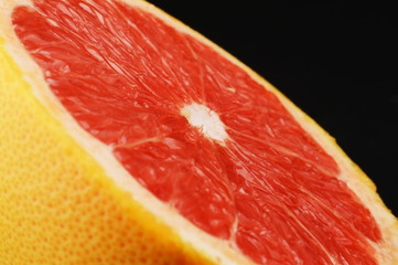 Close up shot half of grapefruit on white background