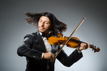 Man violin player in musican concept