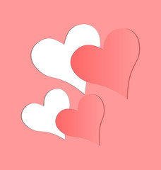 Two hearts cutted in pink paper