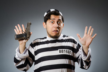 Funny prison inmate with gun