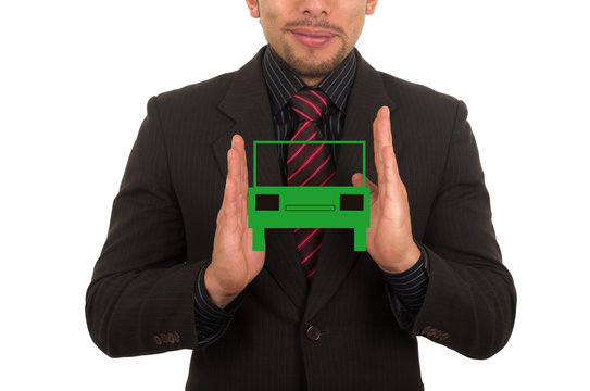 young businessman holding drawn car