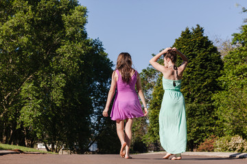 Teen Girls Walking Away Talking Relaxing