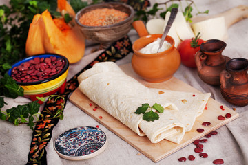 Indian thin pita bread on a board still life