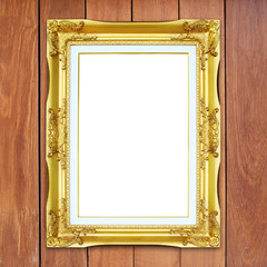 golden frame on wood wall background