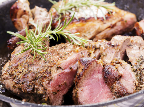 Rustic lamb roast with pan juices and rosemary