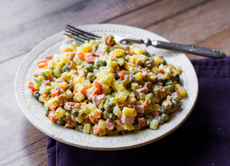 Olivier salad a festive table, new year