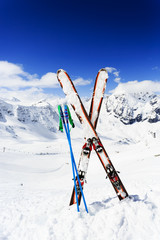 Skiing , mountains and ski equipments on ski run