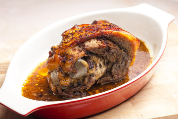 marinated, cooked and slowly baked pork knee