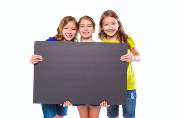 happy kid girls holding black board copyspace