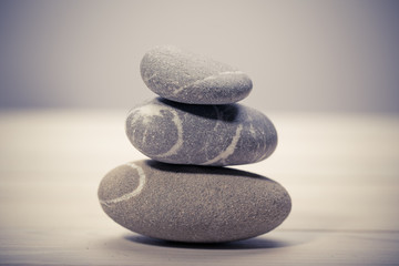 balancing stones isolated on white background. zen stones