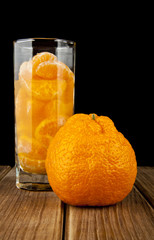 oranges and juice in glass