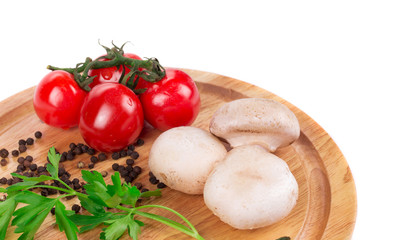 Fresh vegetables on cutting board.