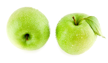 green apples in drops of water