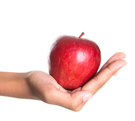 Girl hands holding a red apple over white background