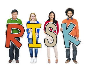 Group of People Standing Holding Word Risk