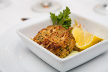 Crab Cake and Lemon Wedge
