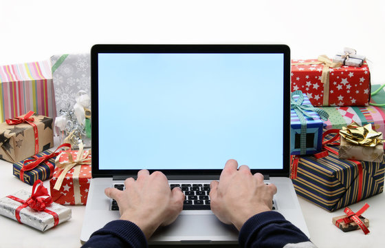 Man Buys Christmas Gifts - Online Shopping Concept