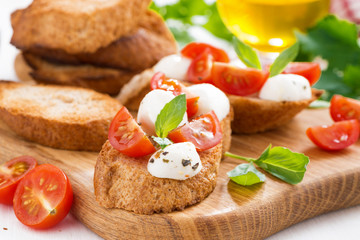 bruschetta with mozzarella, basil and cherry tomatoes