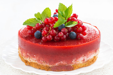 cheesecake with berry jelly, close-up