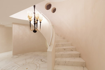 Geometrical interior with marble floor and stairs