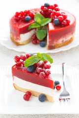Cheesecake with strawberry jelly on a plate