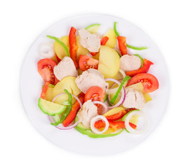 Warm meat salad with vegetables