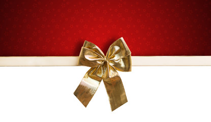 Grußkarte mit goldener Geschenkschleife