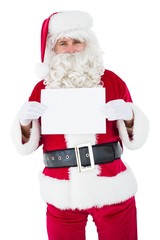 Naklejka premium Smiling santa claus holding page