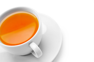 White cup with tea isolated on white background