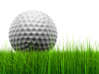 White golf ball in grass isolated