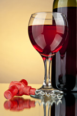 glass and bottle with wine