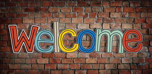 Fototapeta premium Welcome Word and Brick Wall in Background