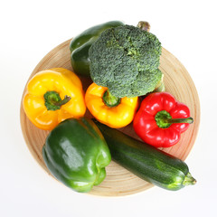 Green,red and yellow bell pepper with broccoli and zucchini