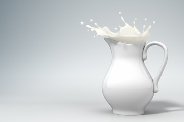 milk splashing from a pitcher